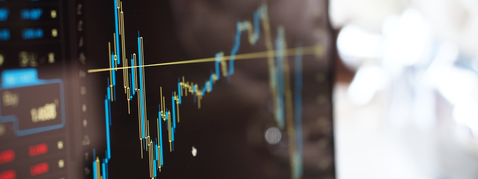 A monitor displaying stock trading information
