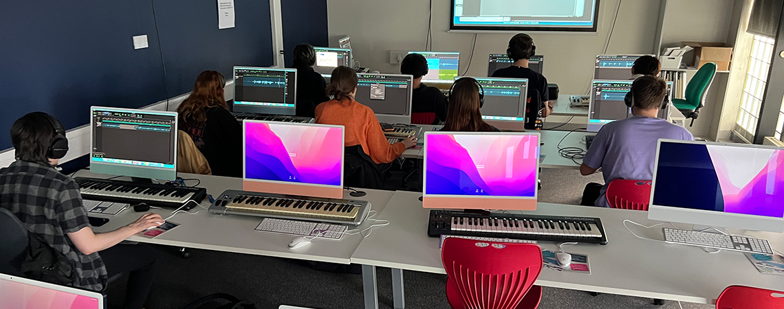 students in audio suite