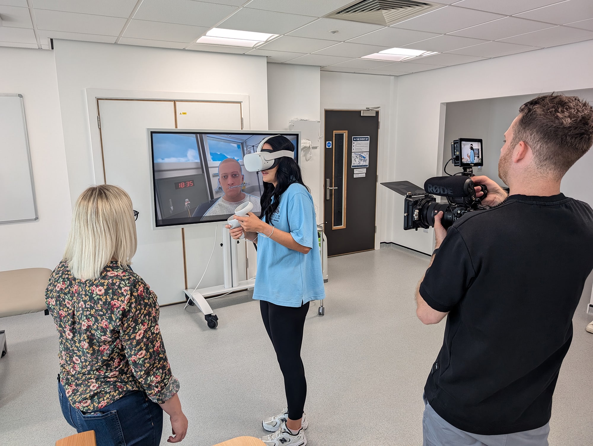 Student using VR being filmed for OMS case study video